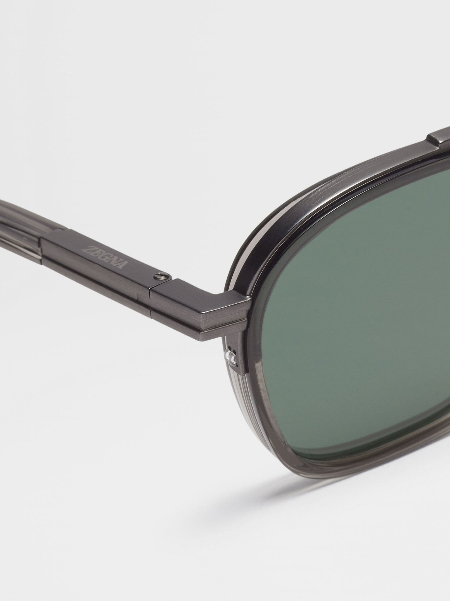 TRANSPARENT DARK GREY ORIZZONTE I ACETATE AND METAL SUNGLASSES