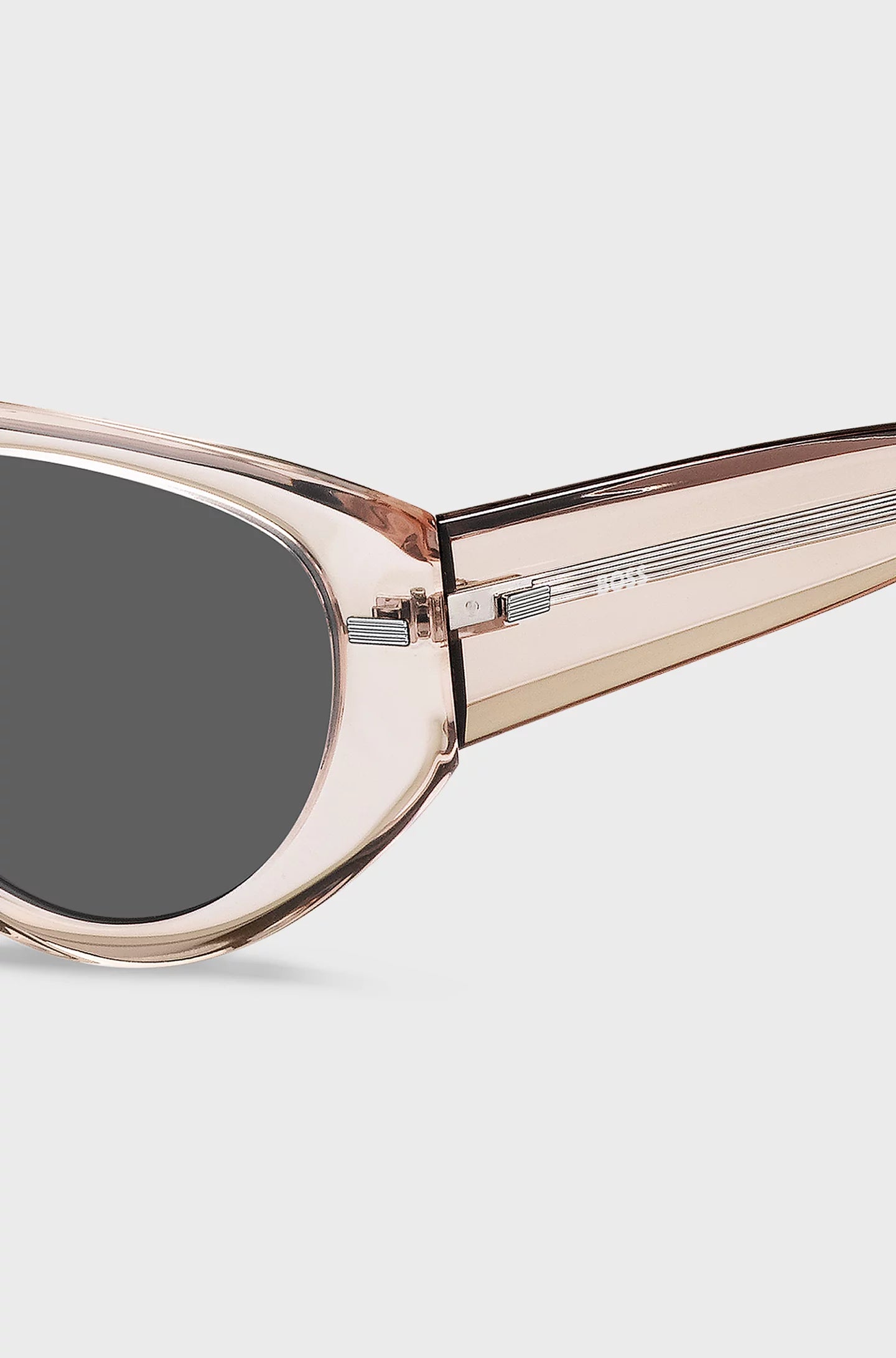 TRANSLUCENT PINK BIO-ACETATE SUNGLASSES WITH PATTERNED RIVETS