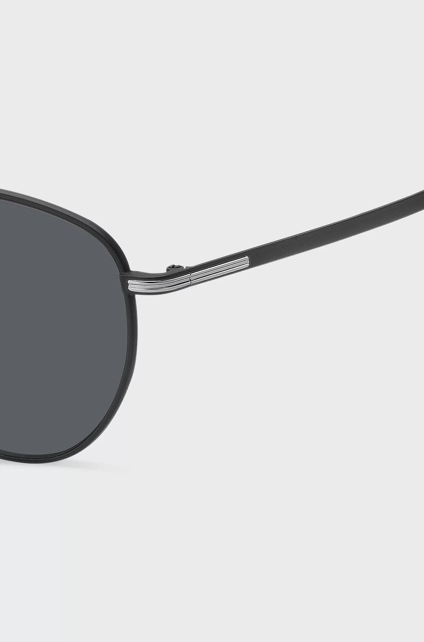 ROUND SUNGLASSES IN BLACK METAL WITH DOUBLE BRIDGE